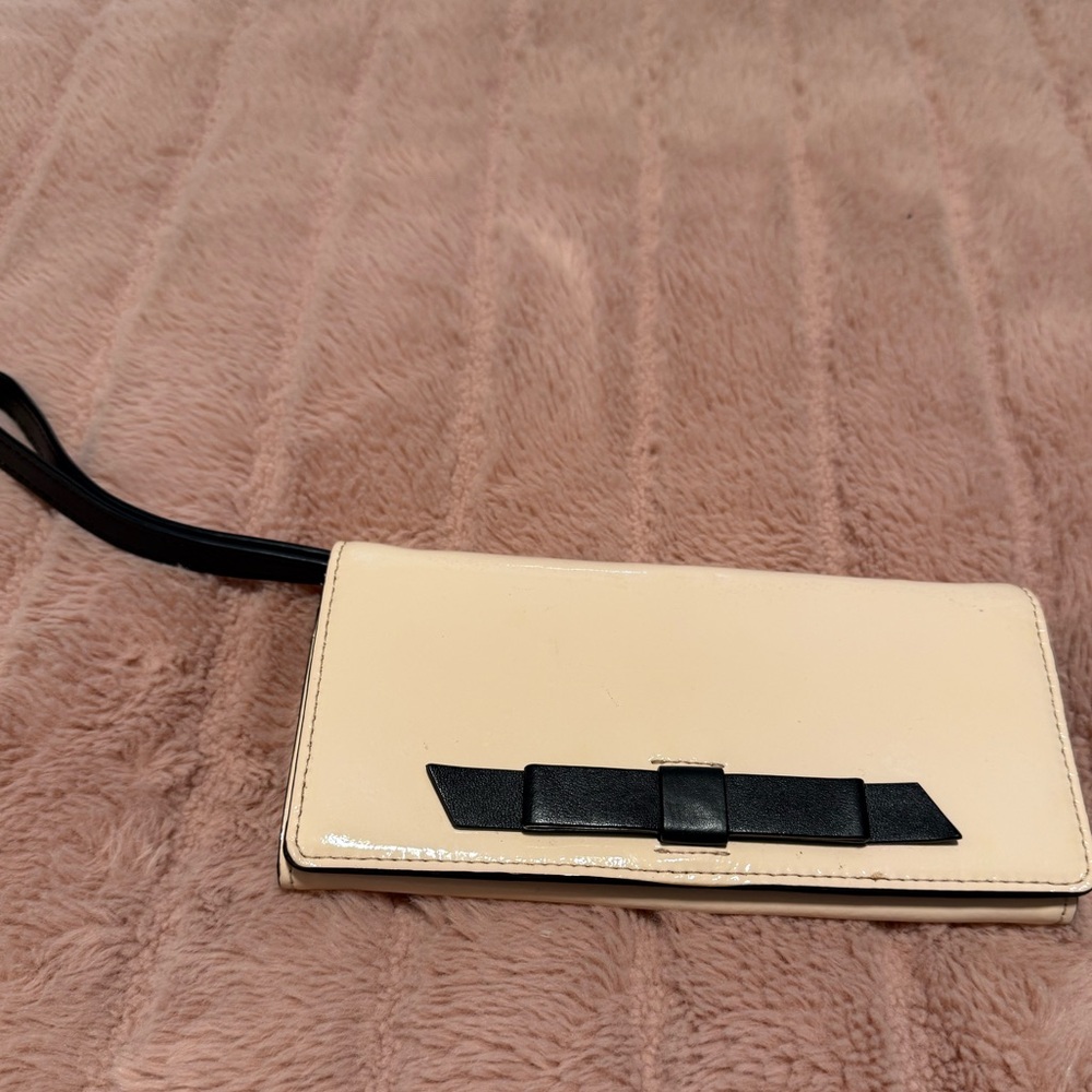 Kate Spade Pink Wallet with Tuck-Away Wrist Strap, Black Bow Lining